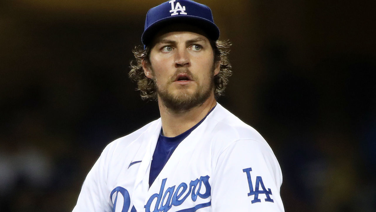 LOS ANGELES, CALIFORNIA - JUNE 12: Trevor Bauer #27 of the Los Angeles Dodgers looks on after giving up a hit to Joey Gallo #13 of the Texas Rangers during the fifth inning at Dodger Stadium on June 12, 2021 in Los Angeles, California.