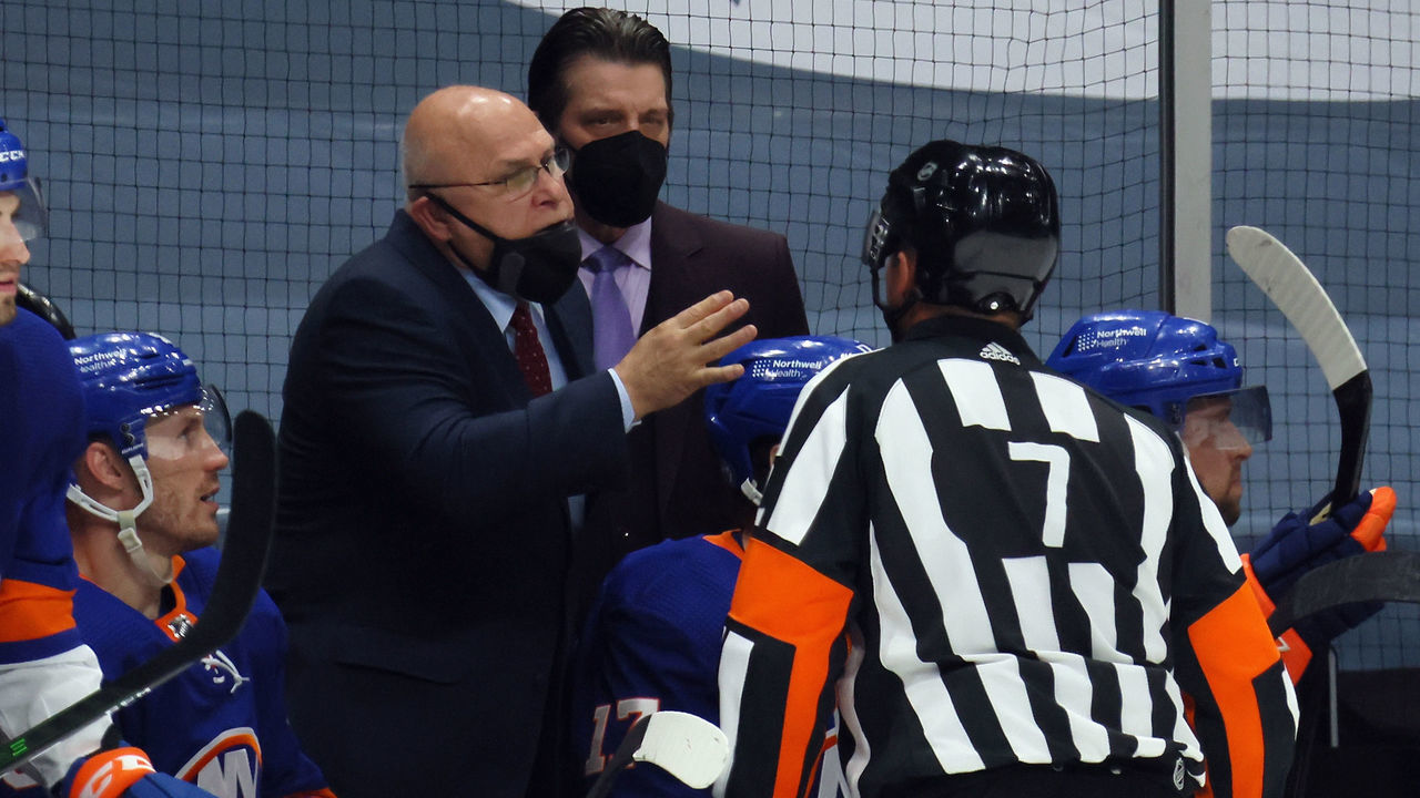 UNIONDALE, NEW YORK - MAY 20: Head coach Barry Trotz of the New York Islanders works the game against the Pittsburgh Penguins in Game Three of the First Round of the 2021 Stanley Cup Playoffs at the Nassau Coliseum on May 20, 2021 in Uniondale, New York. The Penguins defeated the Islanders 5-4.