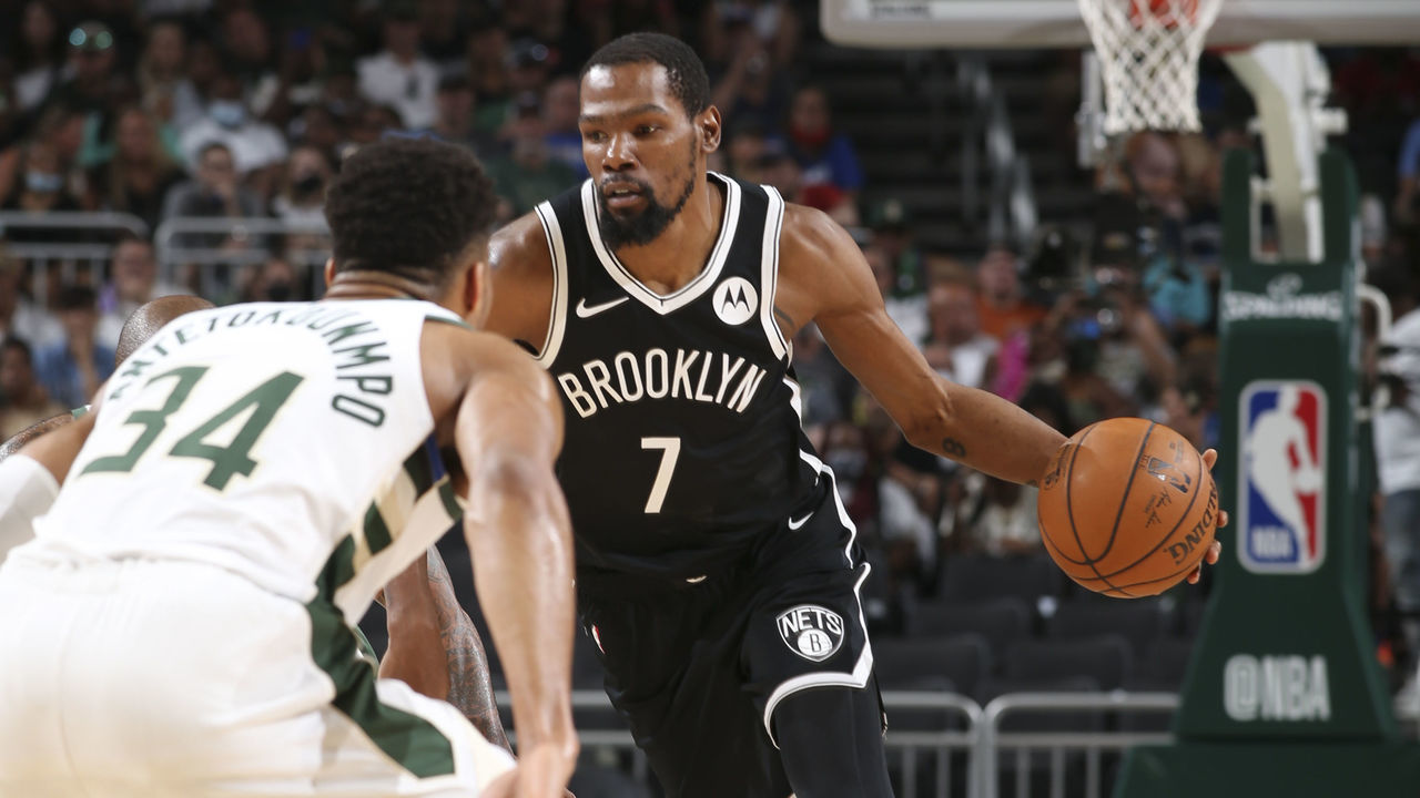 MILWAUKEE, WI - JUNE 13: Kevin Durant #7 of the Brooklyn Nets handles the ball as Giannis Antetokounmpo #34 of the Milwaukee Bucks plays defense during the game during Round 2, Game 4 of the 2021 NBA Playoffs on June 13, 2021 at the Fiserv Forum Center in Milwaukee, Wisconsin. Mandatory Copyright Notice: Copyright 2021 NBAE .