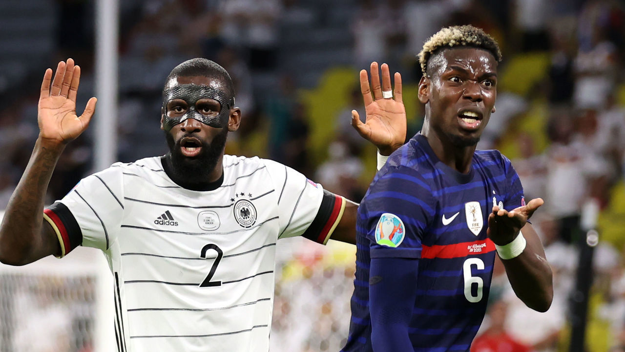 MUNICH, GERMANY - JUNE 15: Antonio Ruediger of Germany and Paul Pogba of France react during the UEFA Euro 2020 Championship Group F match between France and Germany at Football Arena Munich on June 15, 2021 in Munich, Germany.