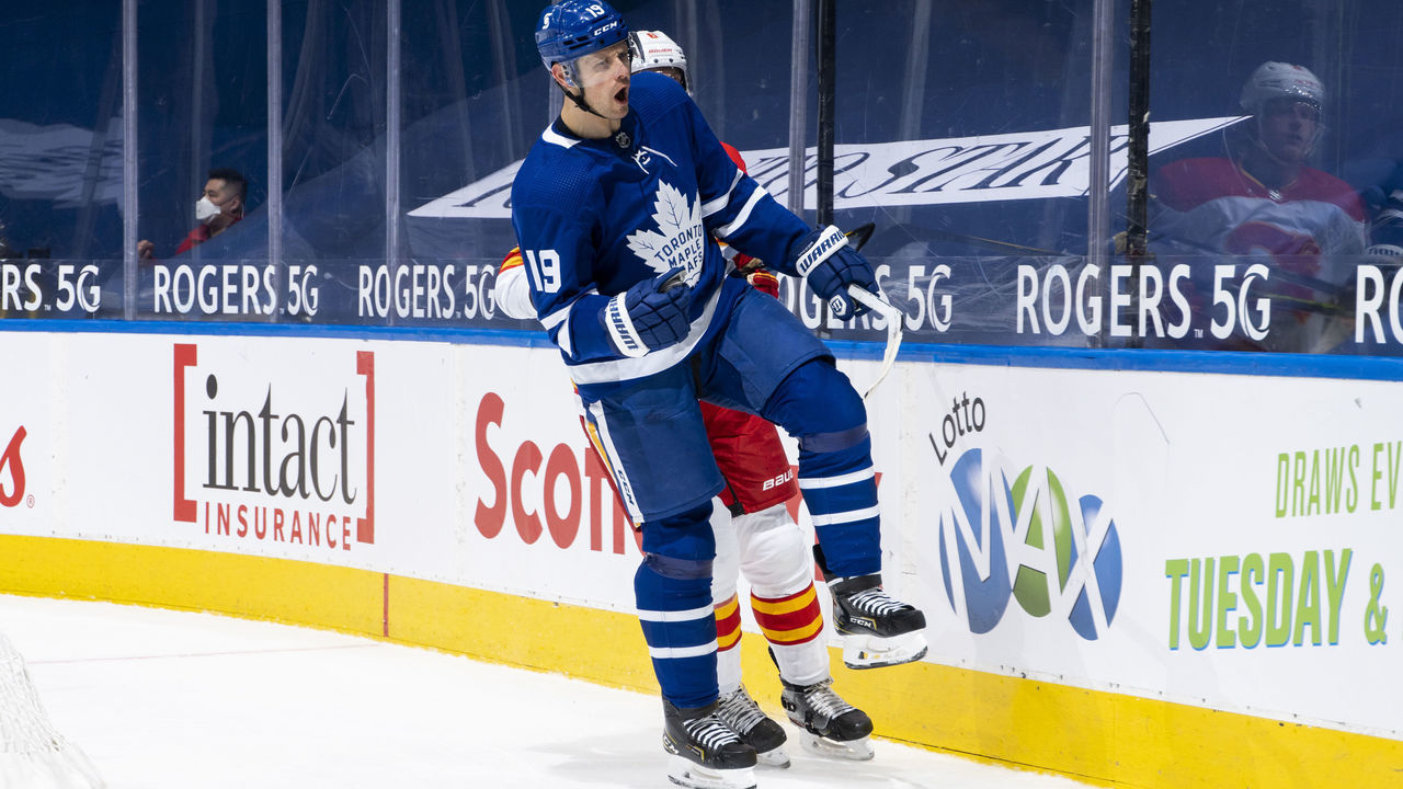 TORONTO, ON - MARCH 20: Jason Spezza #19 of the Toronto Maple Leafs celebrates his goal against the Calgary Flames during the first period at the Scotiabank Arena on March 20, 2021 in Toronto, Ontario, Canada.