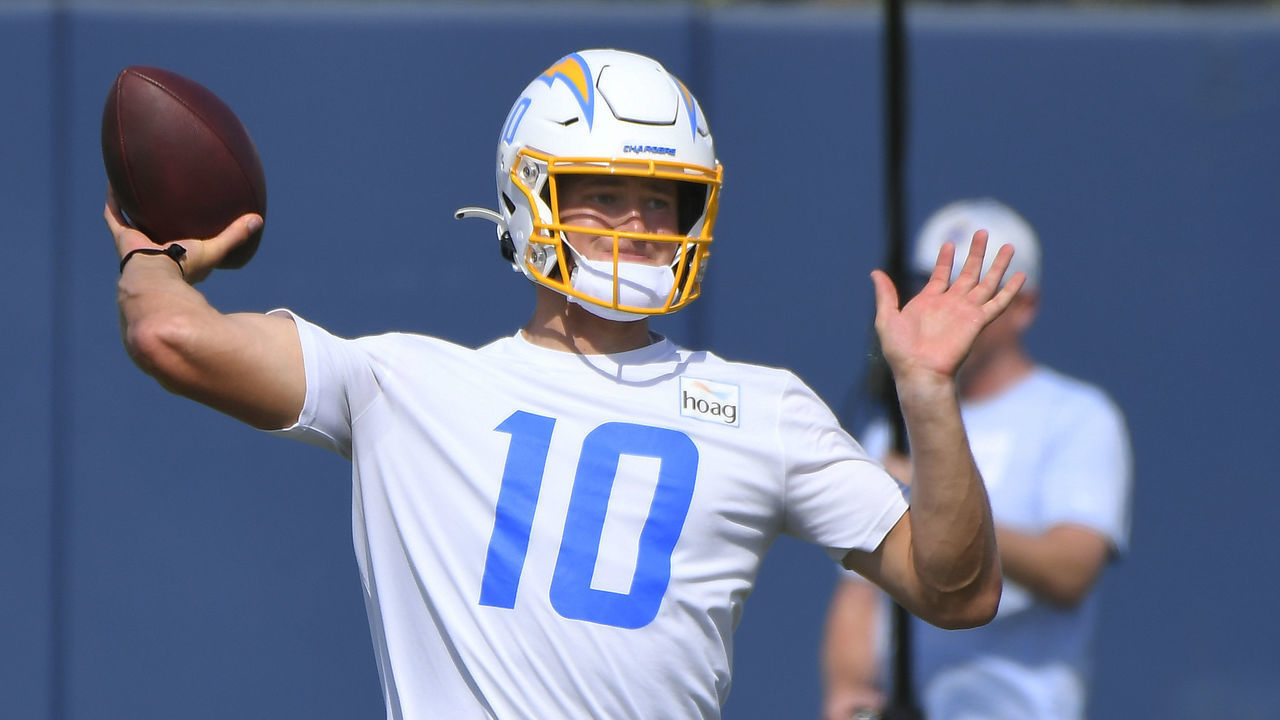 COSTA MESA, CA - JUNE 16: Justin Herbert #10 of the Los Angeles Chargers throws during mandatory minicamp at the Hong Performance Center on June 16, 2021 in Costa Mesa, California.