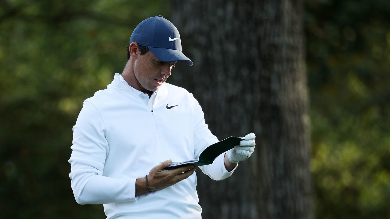 AUGUSTA, GA - APRIL 02: Rory McIlory of Northern Ireland checks his yardage book on the second hole during a practice round prior to the start of the 2018 Masters Tournament at Augusta National Golf Club on April 2, 2018 in Augusta, Georgia.