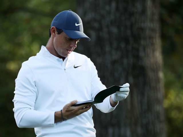 AUGUSTA, GA - APRIL 02: Rory McIlory of Northern Ireland checks his yardage book on the second hole during a practice round prior to the start of the 2018 Masters Tournament at Augusta National Golf Club on April 2, 2018 in Augusta, Georgia.
