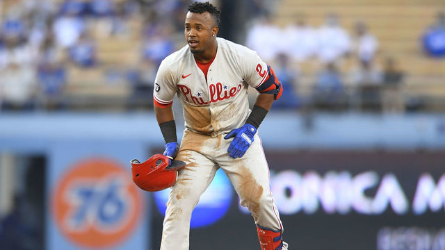 LOS ANGELES, CA - JUNE 14: Jean Segura (2) of the Philadelphia Phillies is safe at second base while playing the Los Angeles Dodgers on June 14, 2021 at Dodger Stadium in Los Angeles, CA.