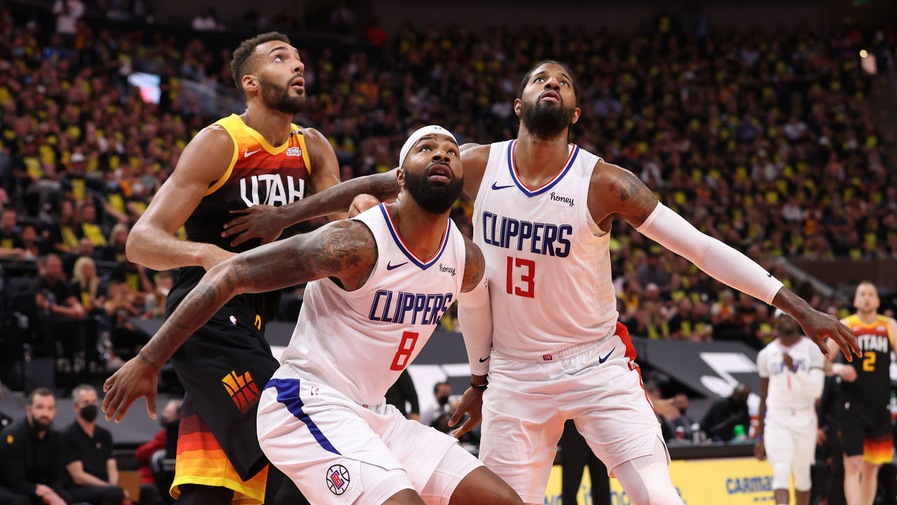 SALT LAKE CITY, UT - JUNE 16: Marcus Morris Sr. #8 and Paul George #13 of the LA Clippers fight for position with Rudy Gobert #27 of the Utah Jazz during Round 2, Game 5 of the 2021 NBA Playoffs on June 16 1, 2021 at vivint.SmartHome Arena in Salt Lake City, Utah. Mandatory Copyright Notice: Copyright 2021 NBAE