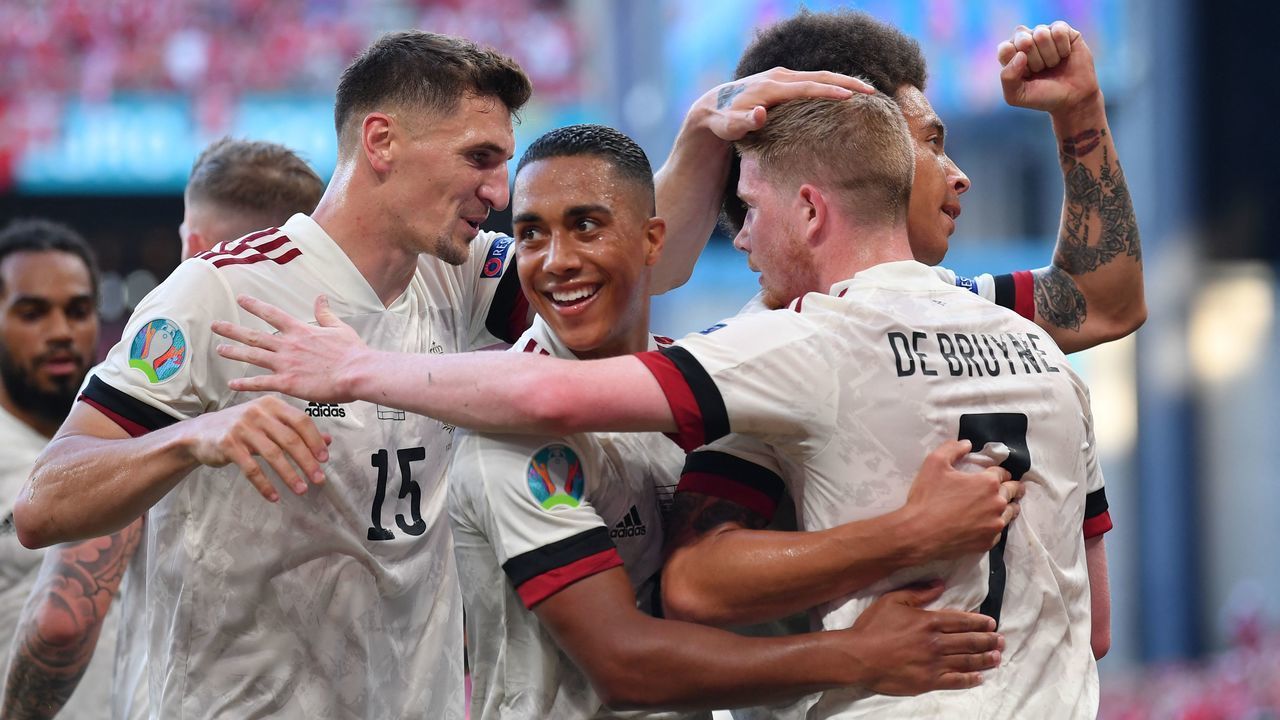 Belgium's players celebrate the team's second goal during the UEFA EURO 2020 Group B football match between Denmark and Belgium at the Parken Stadium in Copenhagen on June 17, 2021.