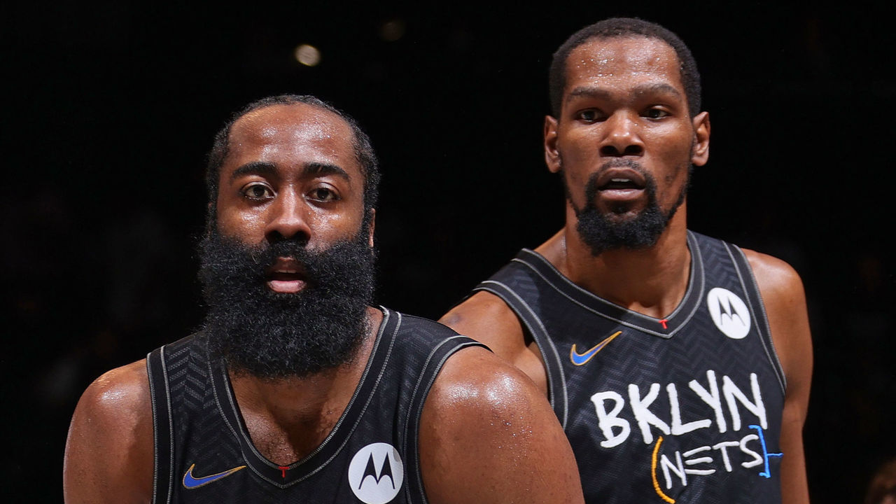 BROOKLYN, NY - JUNE 15: James Harden #13 and Kevin Durant #7 of the Brooklyn Nets look on during Round 2, Game 5 of the 2021 NBA Playoffs on June 15, 2021 at Barclays Center in Brooklyn, New York. Mandatory Copyright Notice: Copyright 2021 NBAE