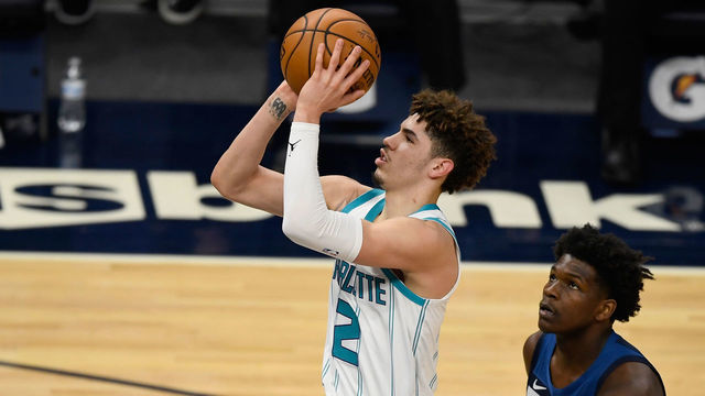 MINNEAPOLIS, MINNESOTA - MARCH 03: Anthony Edwards #1 of the Minnesota Timberwolves watches as LaMelo Ball #2 of the Charlotte Hornets shoots the ball during the first quarter of the game at Target Center on March 3, 2021 in Minneapolis, Minnesota.