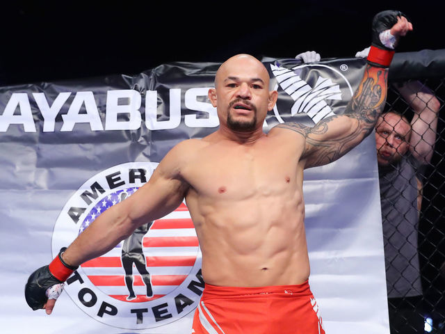 INGLEWOOD, CA - NOVEMBER 24: Gleison Tibau enters the cage for his fight against Efrain Escudero during Chuck Liddell v Tito Ortiz 3 at The Forum on November 24, 2018 in Inglewood, California.