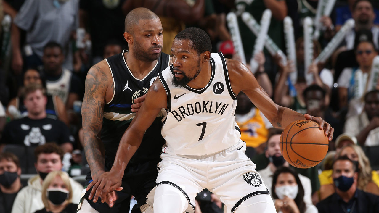 MILWAUKEE, WI - JUNE 17: P.J. Tucker #17 of the Milwaukee Bucks plays defense on Kevin Durant #7 of the Brooklyn Nets during Round 2, Game 6 of the 2021 NBA Playoffs on June 17, 2021 at the Fiserv Forum Center in Milwaukee, Wisconsin. Mandatory Copyright Notice: Copyright 2021 NBAE .