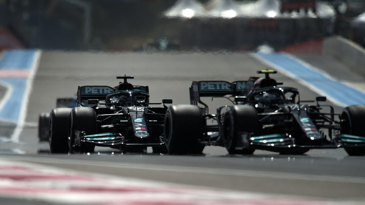 Valtteri Bottas of Finland driving the (77) Mercedes AMG Petronas F1 Team Mercedes W12 and Lewis Hamilton of Great Britain driving the (44) Mercedes AMG Petronas F1 Team Mercedes W12 during practice ahead of the F1 Grand Prix of France at Circuit Paul Ricard on June 18, 2021 in Le Castellet, France.