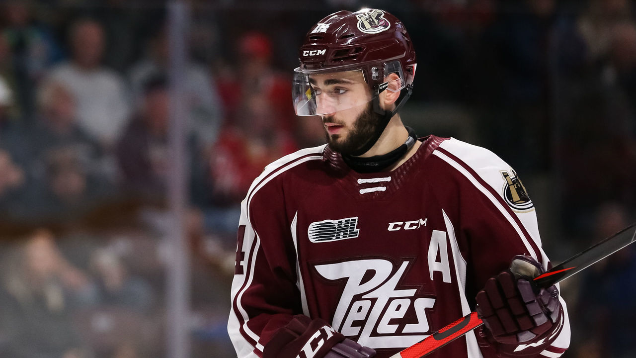 OSHAWA, ON - OCTOBER 20: Liam Kirk #14 of the Peterborough Petes look on during an OHL game against the Oshawa Generals at the Tribute Communities Centre on October 20, 2019 in Oshawa, Ontario, Canada.