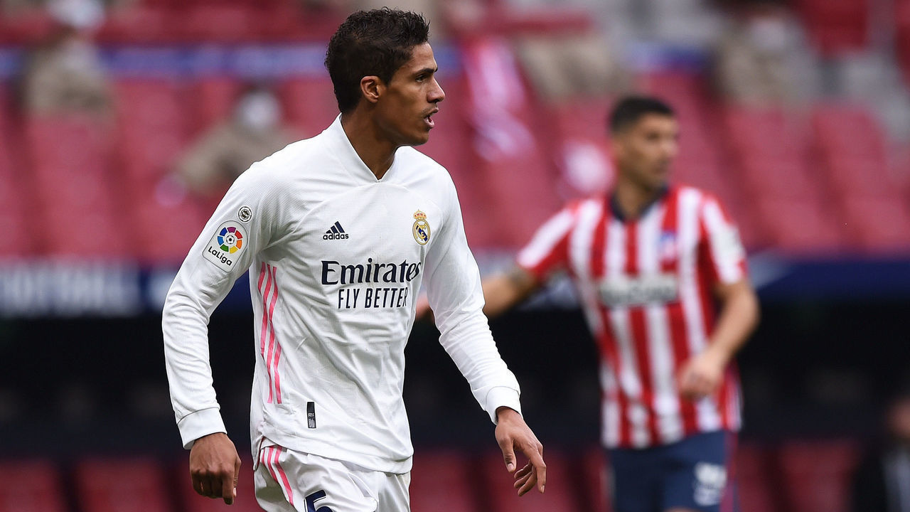 MADRID, SPAIN - MARCH 07: Raphael Varane of Real Madrid looks on during the La Liga Santander match between Atletico de Madrid and Real Madrid at Estadio Wanda Metropolitano on March 07, 2021 in Madrid, Spain. Sporting stadiums around Spain remain under strict restrictions due to the Coronavirus Pandemic as Government social distancing laws prohibit fans inside venues resulting in games being played behind closed doors.