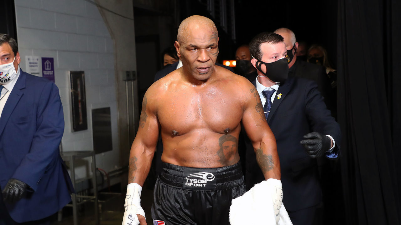 LOS ANGELES, CALIFORNIA - NOVEMBER 28: Mike Tyson exits the ring after receiving a split draw against Roy Jones Jr. during Mike Tyson vs Roy Jones Jr. presented by Triller at Staples Center on November 28, 2020 in Los Angeles, California.