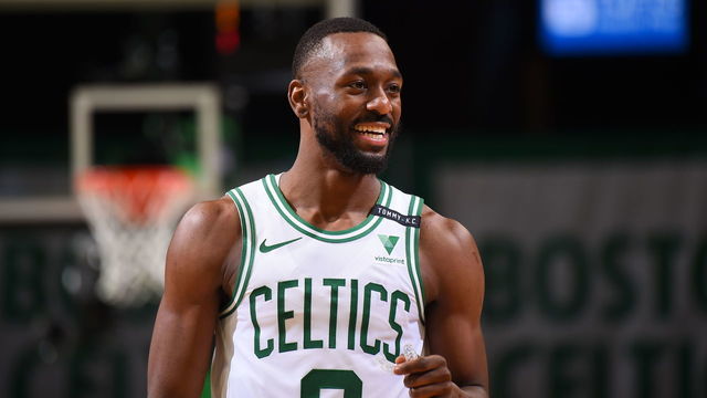 BOSTON, MA - FEBRUARY 16: Kemba Walker #8 of the Boston Celtics smiles during the game against the Denver Nuggets on February 16, 2021 at the TD Garden in Boston, Massachusetts. Mandatory Copyright Notice: Copyright 2021 NBAE