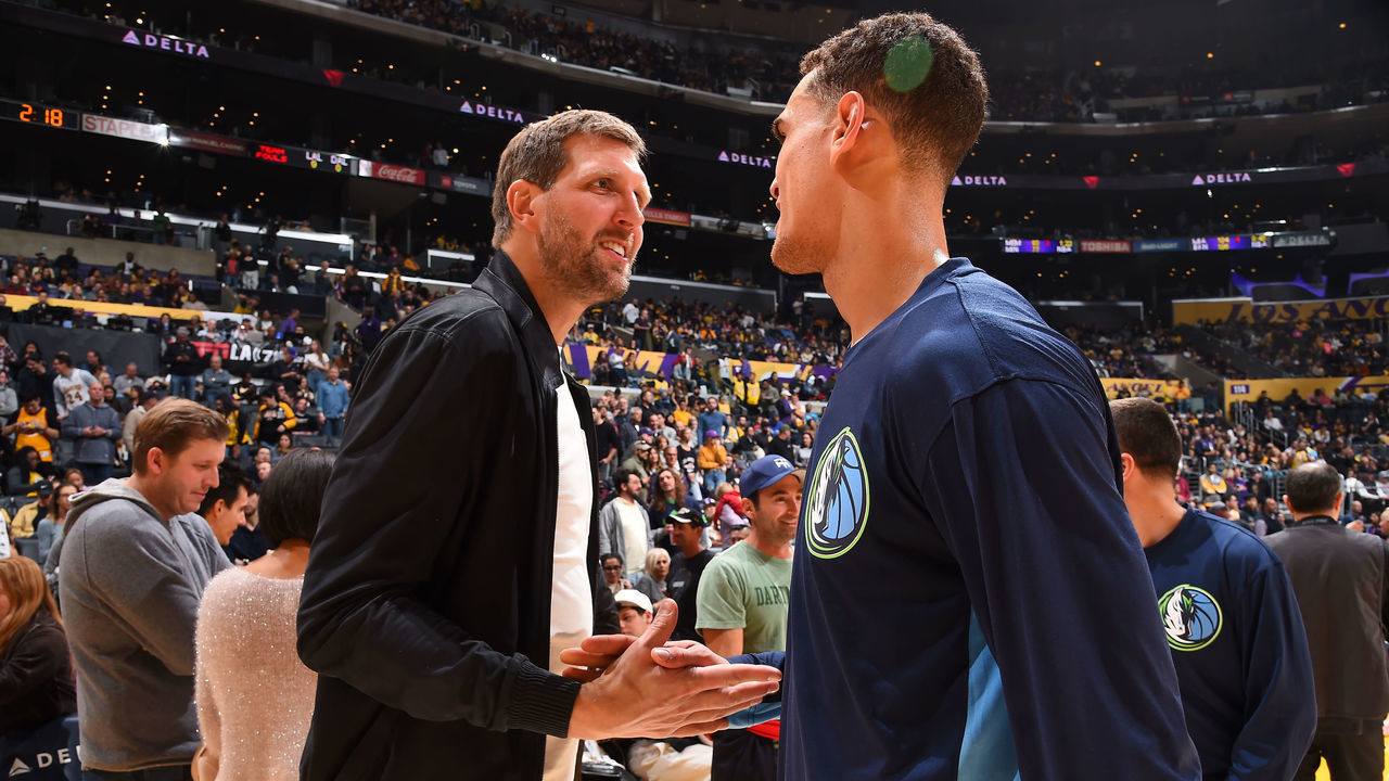 LOS ANGELES, CA - DECEMBER 1: NBA Legend, Dirk Nowitzki and Dwight Powell #7 of the Dallas Mavericks shake hands after the game against the Los Angeles Lakers on December 1, 2019 at STAPLES Center in Los Angeles, California. NOTE TO USER: User expressly acknowledges and agrees that, by downloading and/or using this Photograph, user is consenting to the terms and conditions of the Getty Images License Agreement. Mandatory Copyright Notice: Copyright 2019 NBAE
