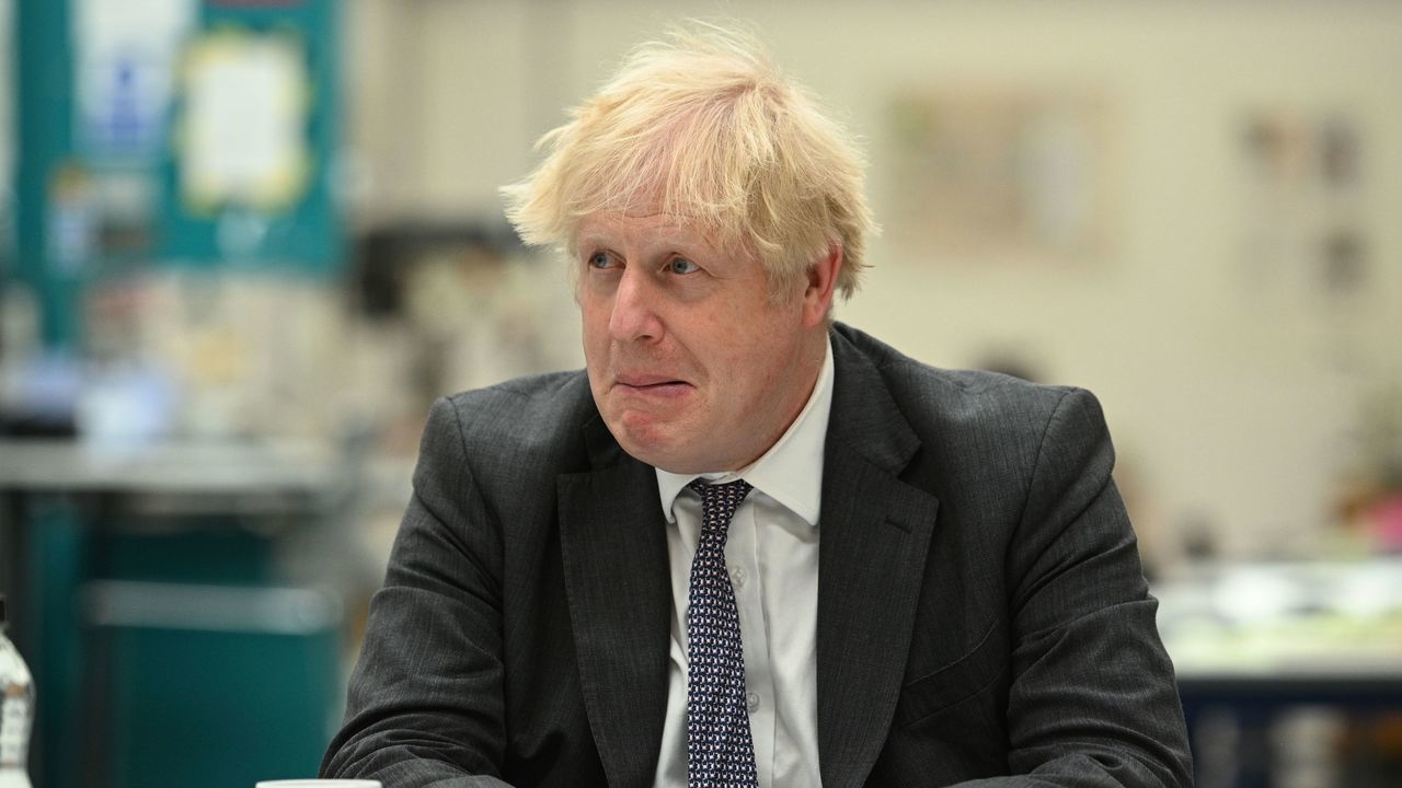 DEWSBURY, ENGLAND - JUNE 18: Britain's Prime Minister Boris Johnson gestures as he chats with teachers in the Arts and Design area during a visit to Kirklees College Springfield Sixth Form Centre on June 18, 2021 in Dewsbury, United Kingdom.