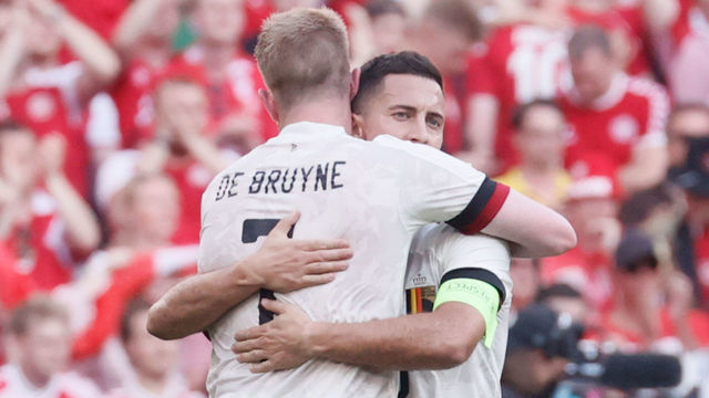 Belgium's Kevin De Bruyne and Belgium's Eden Hazard celebrate after a second game of the group stage (group B) at UEFA Euro 2020 championships between Belgian national soccer team Red Devils and Denmark, in Copenhagen, Denmark, Thursday 17 June 2021. BELGA PHOTO BRUNO FAHY
