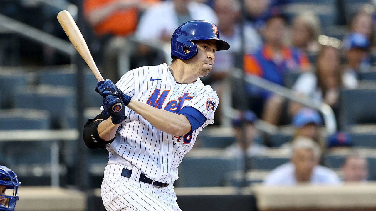 NEW YORK, NEW YORK - JUNE 16: Jacob deGrom #48 of the New York Mets hits an RBI single as Jose Lobaton #7 of the Chicago Cubs defends in the second inning at Citi Field on June 16, 2021 in the Flushing neighborhood of the Queens borough of New York City.