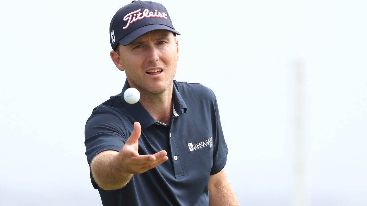 SAN DIEGO, CALIFORNIA - JUNE 18: Russell Henley of the United States tosses his golf ball on the second hole during the second round of the 2021 U.S. Open at Torrey Pines Golf Course (South Course) on June 18, 2021 in San Diego, California.