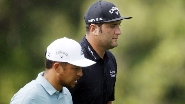 KAPALUA, HAWAII - JANUARY 07: Jon Rahm of Spain and Xander Schauffele of the United States walk on the ninth hole during the first round of the Sentry Tournament Of Champions at the Kapalua Plantation Course on January 07, 2021 in Kapalua, Hawaii.
