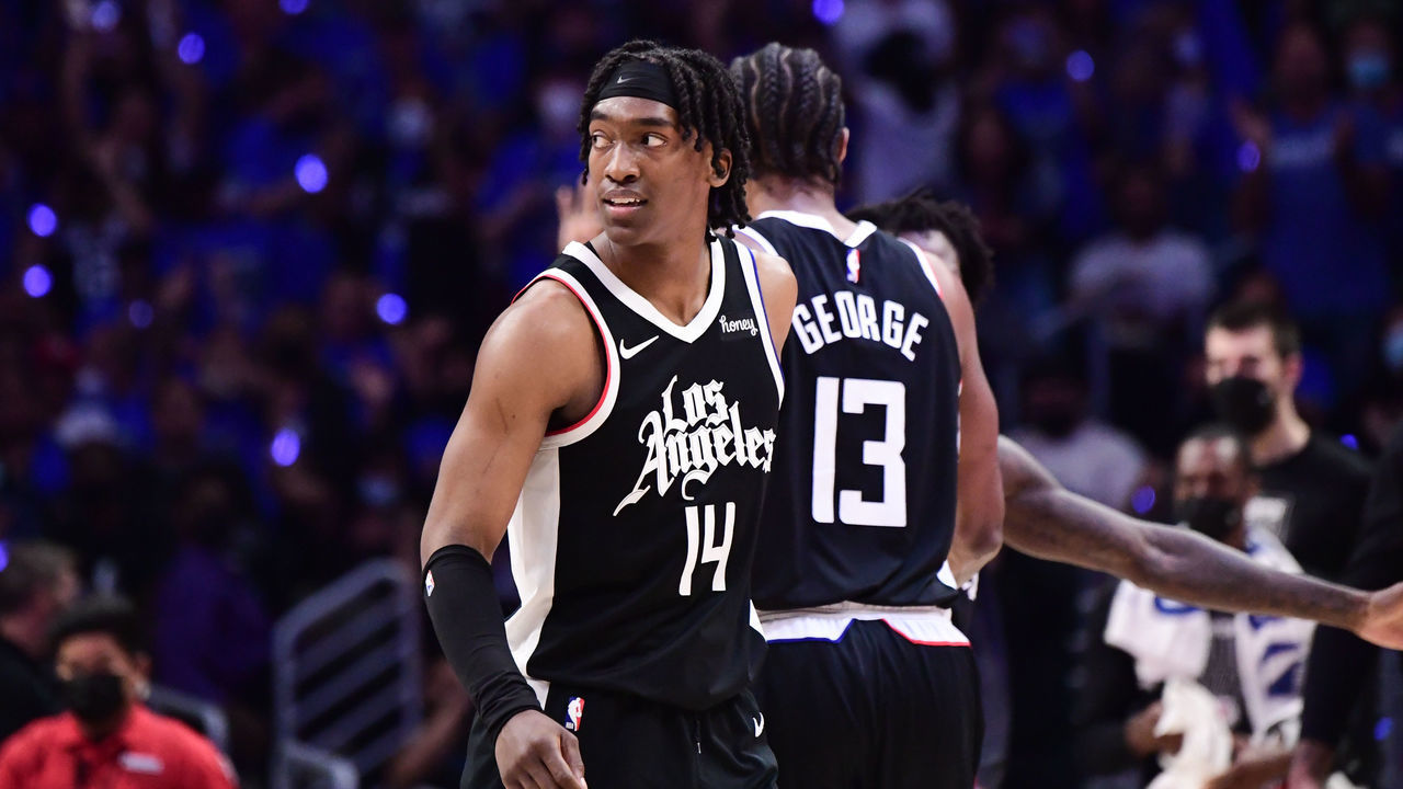 LOS ANGELES, CA - JUNE 18: Terance Mann #14 of the LA Clippers looks on during the game against the Utah Jazz during Round 2, Game 6 of the 2021 NBA Playoffs on June 18, 2021 at STAPLES Center in Los Angeles, California. NOTE TO USER: User expressly acknowledges and agrees that, by downloading and/or using this Photograph, user is consenting to the terms and conditions of the Getty Images License Agreement. Mandatory Copyright Notice: Copyright 2021 NBAE