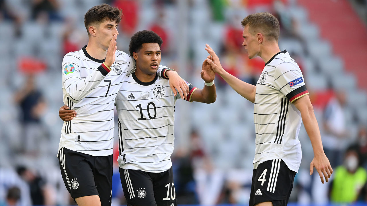 MUNICH, GERMANY - JUNE 19: Kai Havertz of Germany celebrates with Serge Gnabry after scoring their side's third goal during the UEFA Euro 2020 Championship Group F match between Portugal and Germany at Football Arena Munich on June 19, 2021 in Munich, Germany.