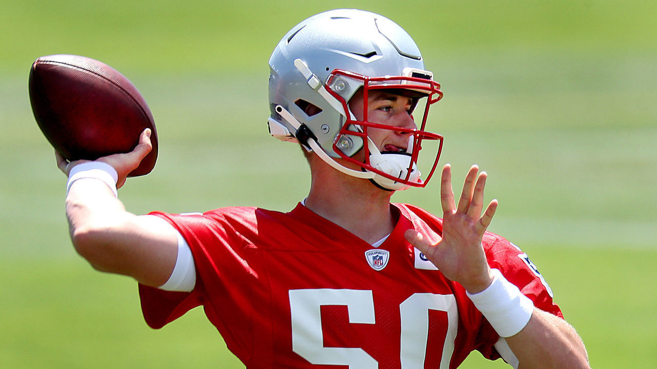 Foxborough, MA - June 16: Mac Jones fires a pass. The New England Patriots hold a minicamp at their practice field at Gillette Stadium in Foxborough, MA on June 16, 2021.