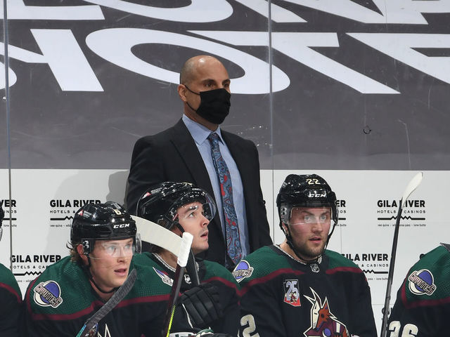 GLENDALE, ARIZONA - JANUARY 14: Head coach Rick Tocchet of the Arizona Coyotes looks on from the bench during a game against the San Jose Sharks at Gila River Arena on January 14, 2021 in Glendale, Arizona.