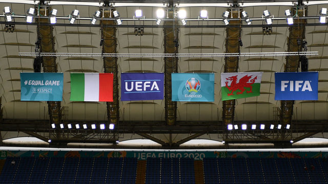 ROME, ITALY - JUNE 20: A general view inside the stadium as the flags of Italy and Wales are seen alongside the flags of UEFA and FIFA prior to the UEFA Euro 2020 Championship Group A match between Italy and Wales at Olimpico Stadium on June 20, 2021 in Rome, Italy.