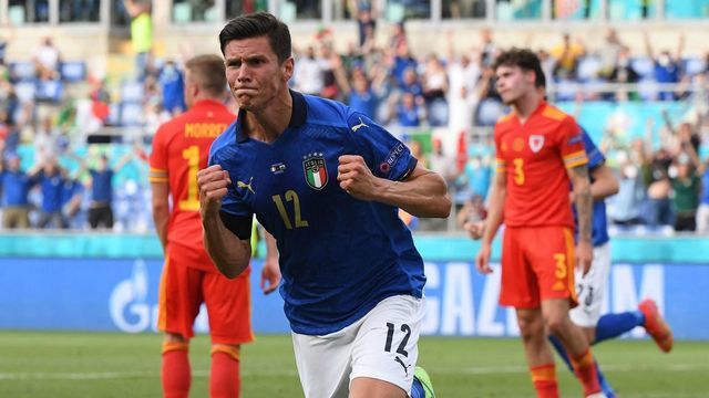 TOPSHOT - Italy's midfielder Matteo Pessina runs to celebrate the opening goal during the UEFA EURO 2020 Group A football match between Italy and Wales at the Olympic Stadium in Rome on June 20, 2021.