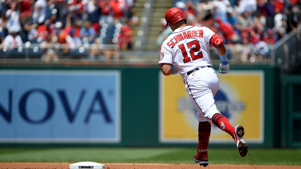 WASHINGTON, DC - JUNE 20: Kyle Schwarber #12 of the Washington Nationals rounds the bases after hitting a solo home run against the New York Mets during the first inning at Nationals Park on June 20, 2021 in Washington, DC.