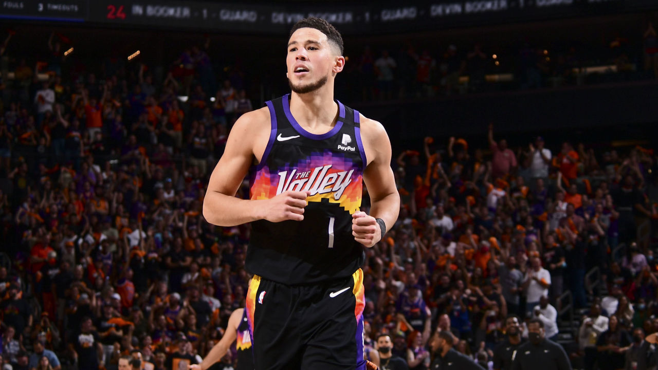 PHOENIX, AZ - JUNE 20: Devin Booker #1 of the Phoenix Suns smiles during the game against the LA Clippers during Game 1 of the Western Conference Finals of the 2021 NBA Playoffs on June 20, 2021 at Phoenix Suns Arena in Phoenix, Arizona. Mandatory Copyright Notice: Copyright 2021 NBAE