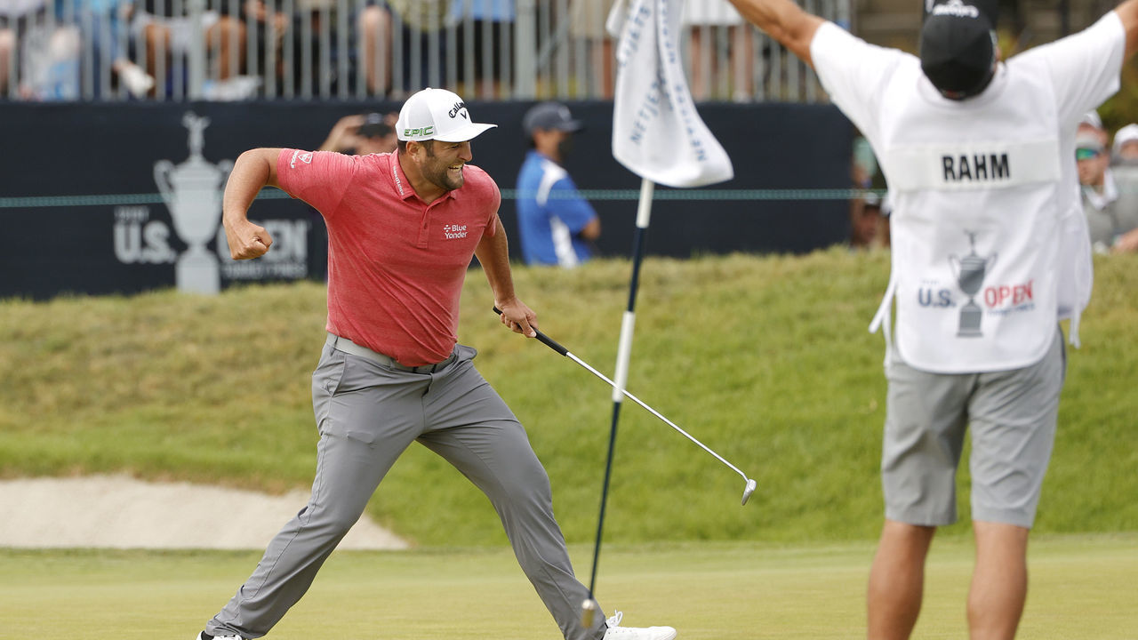 SAN DIEGO, CALIFORNIA - JUNE 20: Jon Rahm of Spain celebrates making a putt for birdie on the 18th green during the final round of the 2021 U.S. Open at Torrey Pines Golf Course (South Course) on June 20, 2021 in San Diego, California.