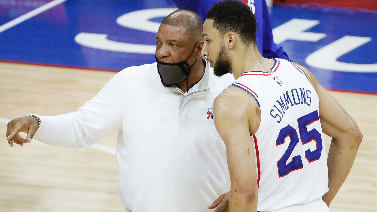 PHILADELPHIA, PENNSYLVANIA - APRIL 28: Head coach Doc Rivers of the Philadelphia 76ers speaks with Ben Simmons #25 during the first quarter against the Atlanta Hawks at Wells Fargo Center on April 28, 2021 in Philadelphia, Pennsylvania.