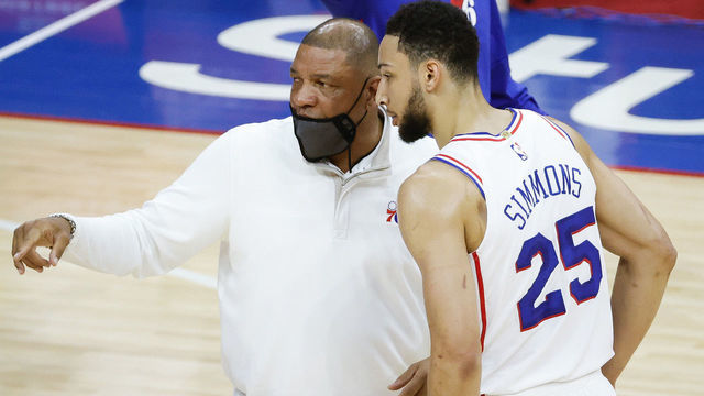 PHILADELPHIA, PENNSYLVANIA - APRIL 28: Head coach Doc Rivers of the Philadelphia 76ers speaks with Ben Simmons #25 during the first quarter against the Atlanta Hawks at Wells Fargo Center on April 28, 2021 in Philadelphia, Pennsylvania.