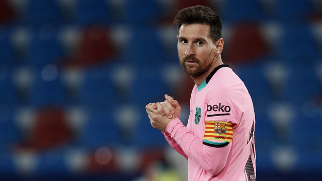 Lionel Messi of Barcelona reacts during the La Liga Santander match between Levante UD and FC Barcelona at Ciutat de Valencia Stadium on May 11, 2021 in Valencia, Spain. Sporting stadiums around Spain remain under strict restrictions due to the Coronavirus Pandemic as Government social distancing laws prohibit fans inside venues resulting in games being played behind closed doors.