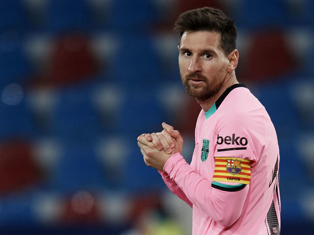 Lionel Messi of Barcelona reacts during the La Liga Santander match between Levante UD and FC Barcelona at Ciutat de Valencia Stadium on May 11, 2021 in Valencia, Spain. Sporting stadiums around Spain remain under strict restrictions due to the Coronavirus Pandemic as Government social distancing laws prohibit fans inside venues resulting in games being played behind closed doors.