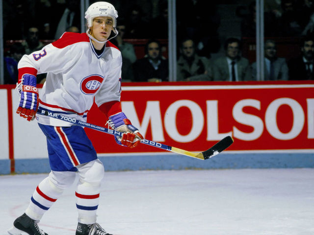 MONTREAL, CANADA - CIRCA 1980: Tom Kurvers #18 of the Montreal Canadiens skates Circa 1980 at the Montreal Forum in Montreal, Quebec, Canada.