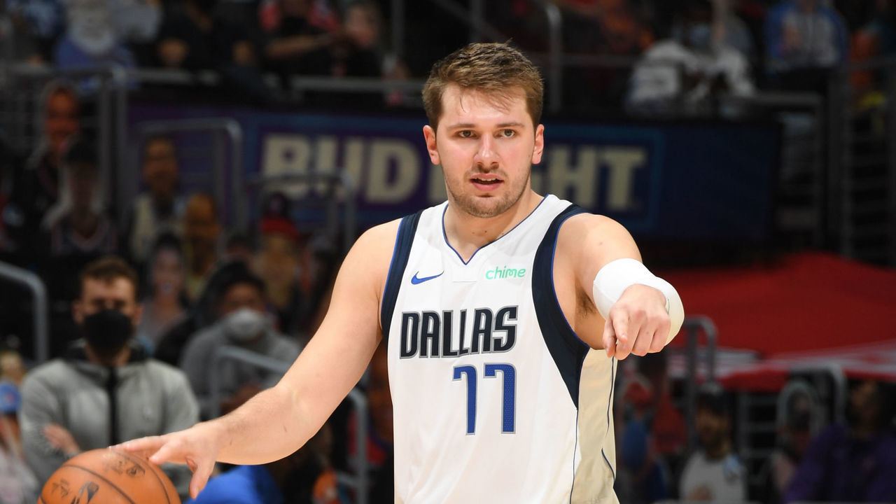 LOS ANGELES, CA - JUNE 6: Luka Doncic #77 of the Dallas Mavericks dribbles the ball against the Dallas Mavericks during Round 1, Game 7 of the 2021 NBA Playoffs on June 6, 2021 at STAPLES Center in Los Angeles, California. NOTE TO USER: User expressly acknowledges and agrees that, by downloading and/or using this Photograph, user is consenting to the terms and conditions of the Getty Images License Agreement. Mandatory Copyright Notice: Copyright 2021 NBAE