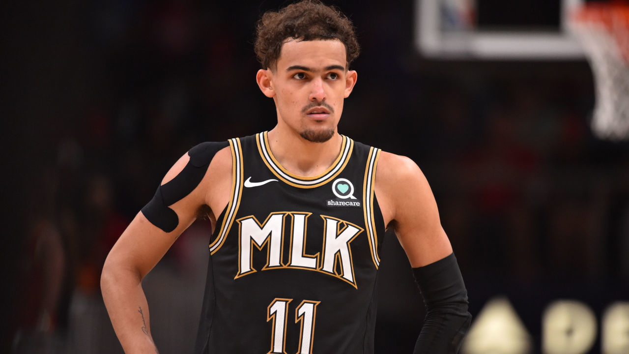 ATLANTA, GA - JUNE 18: Trae Young #11 of the Atlanta Hawks looks on during a game against the Philadelphia 76ers during Round 2, Game 6 of the Eastern Conference Playoffs on June 18, 2021 at State Farm Arena in Atlanta, Georgia. NOTE TO USER: User expressly acknowledges and agrees that, by downloading and/or using this Photograph, user is consenting to the terms and conditions of the Getty Images License Agreement. Mandatory Copyright Notice: Copyright 2021 NBAE