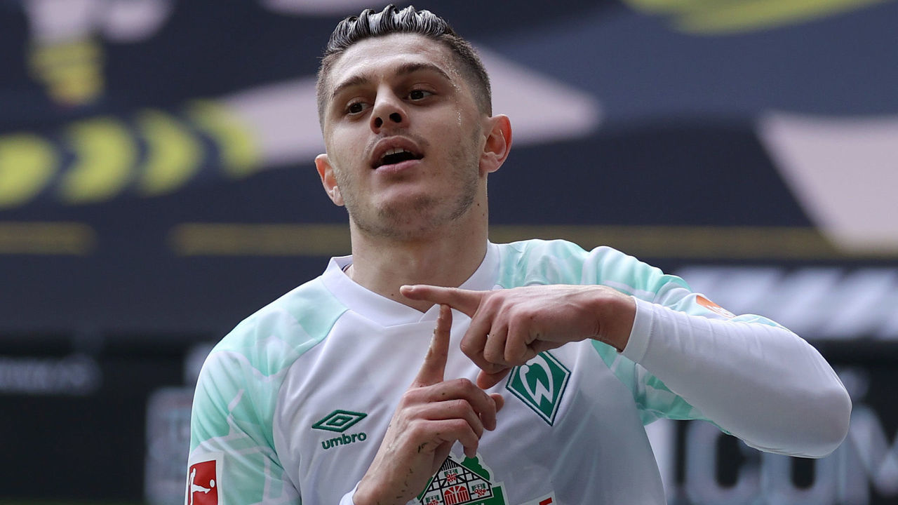 DORTMUND, GERMANY - APRIL 18: Milot Rashica of Werder Bremen celebrates after scoring their team's first goal during the Bundesliga match between Borussia Dortmund and SV Werder Bremen at Signal Iduna Park on April 18, 2021 in Dortmund, Germany. Sporting stadiums around Germany remain under strict restrictions due to the Coronavirus Pandemic as Government social distancing laws prohibit fans inside venues resulting in games being played behind closed doors.
