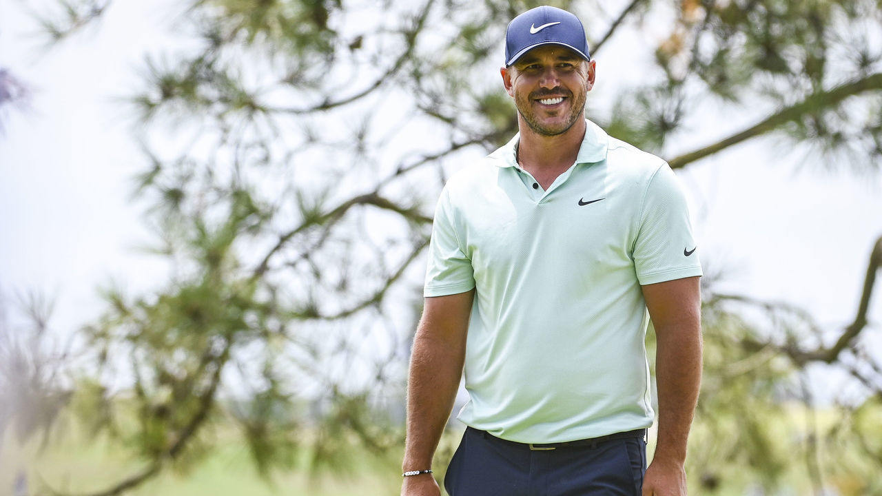 SAN DIEGO, CA - JUNE 19: Brooks Koepka smiles after making a birdie putt on the 10th hole green during the third round of the 121st U.S. Open on the South Course at Torrey Pines Golf Course on June 19, 2021 in La Jolla, San Diego, California.