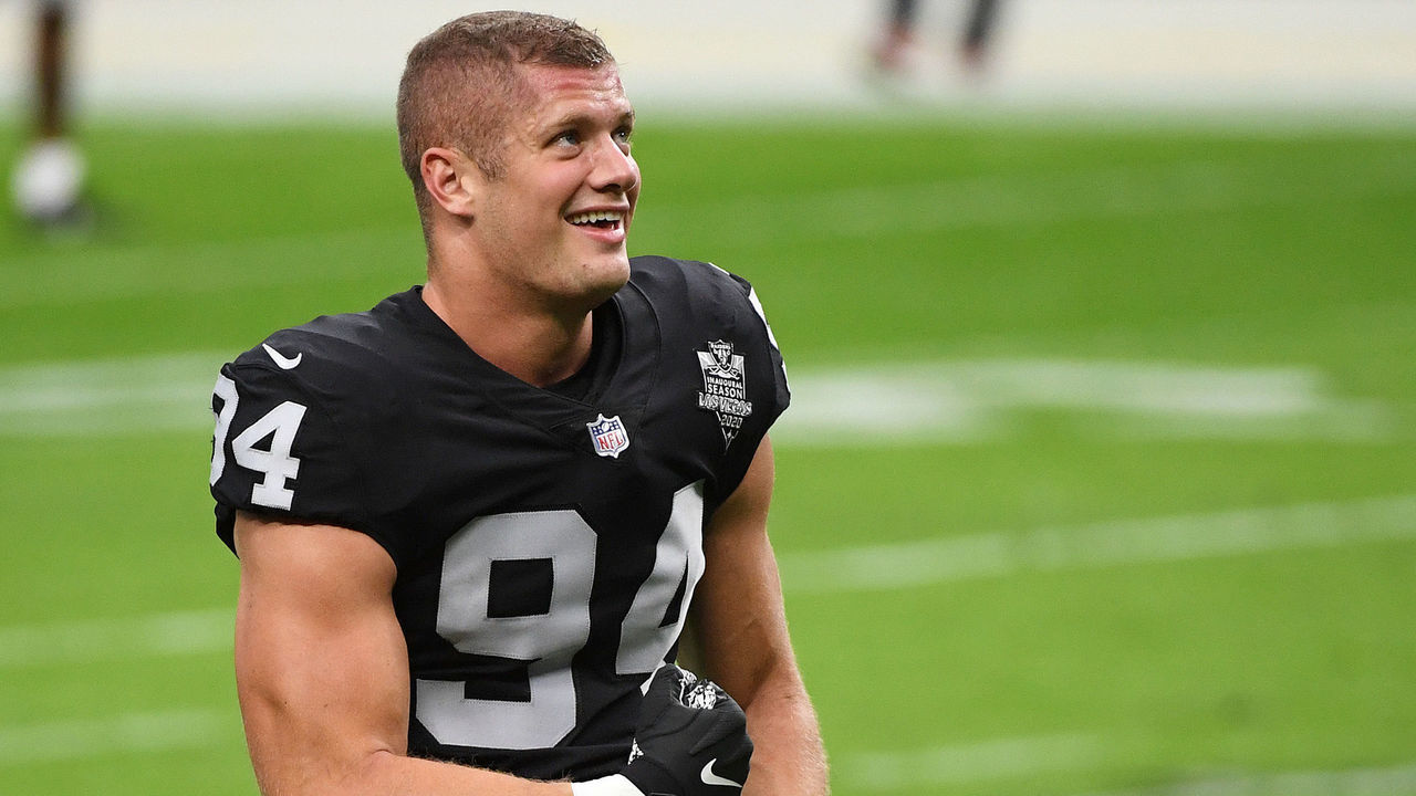 LAS VEGAS, NEVADA - NOVEMBER 15: Carl Nassib #94 of the Las Vegas Raiders flexes while smiling during warmups before a game against the Denver Broncos at Allegiant Stadium on November 15, 2020 in Las Vegas, Nevada.