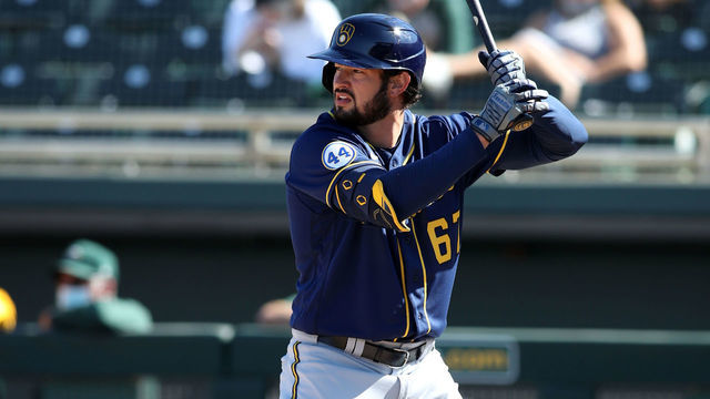 MESA, AZ - MARCH 10: Dylan Cozens #67 of the Milwaukee Brewers bats during the game against the Oakland Athletics at Hohokam Park on March 10, 2021 in Mesa, Arizona. The Athletics defeated the Brewers 9-1.