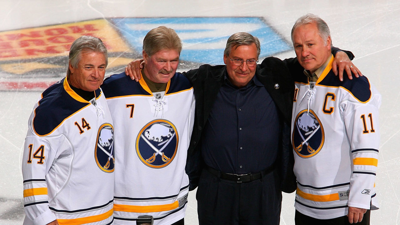BUFFALO, NY - FEBRUARY 23: New Buffalo Sabres owner Terry Pegula stands with former Sabres palyers Rene Robert #14, Rick Martin #7 and Gilbert Perreault #11 during pre game ceremonies prior to play against the Atlanta Thrashers at HSBC Arena on February 23, 2011 in Buffalo, New York.