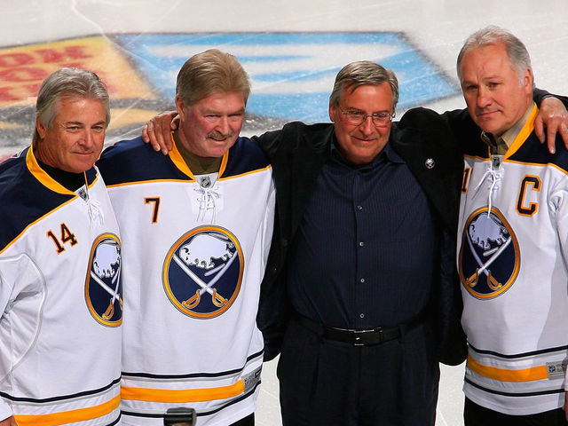 BUFFALO, NY - FEBRUARY 23: New Buffalo Sabres owner Terry Pegula stands with former Sabres palyers Rene Robert #14, Rick Martin #7 and Gilbert Perreault #11 during pre game ceremonies prior to play against the Atlanta Thrashers at HSBC Arena on February 23, 2011 in Buffalo, New York.