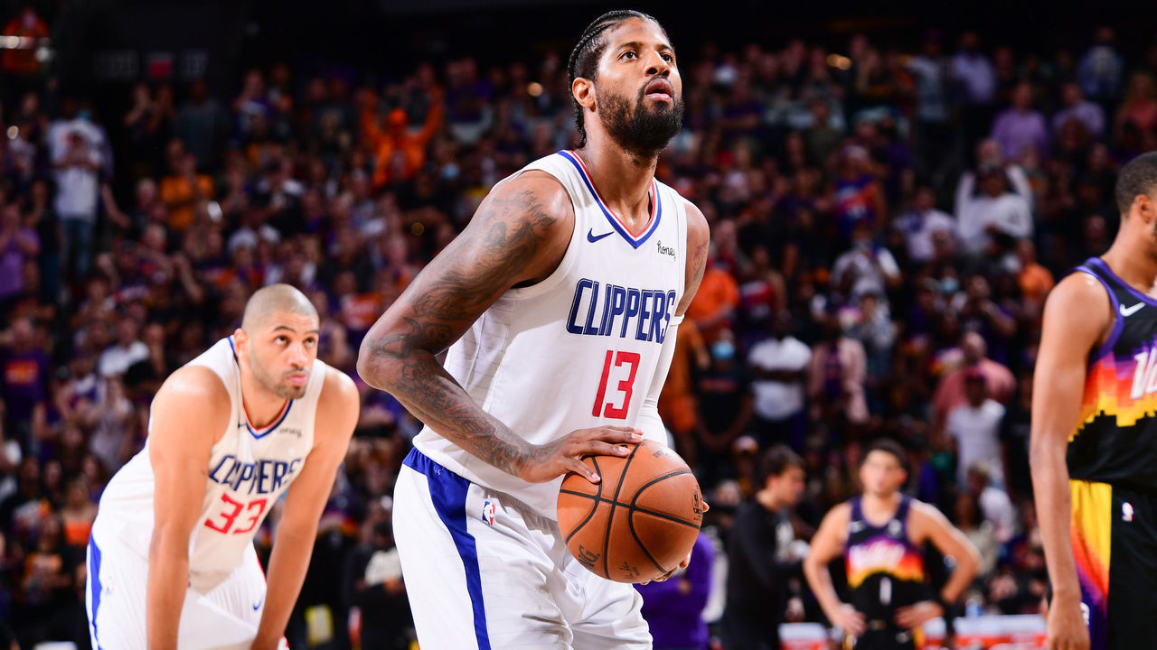 PHOENIX, AZ - JUNE 22: Paul George #13 of the LA Clippers shoots a free throw during the game against the Phoenix Suns during Game 2 of the Western Conference Finals of the 2021 NBA Playoffs on June 22, 2021 at Phoenix Suns Arena in Phoenix, Arizona. Mandatory Copyright Notice: Copyright 2021 NBAE