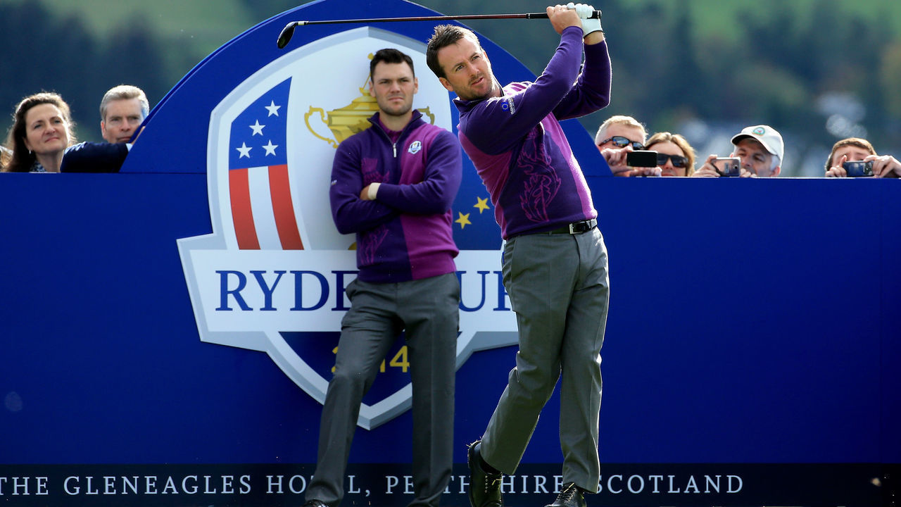 AUCHTERARDER, SCOTLAND - SEPTEMBER 24: Graeme McDowell of Europe tees off watched by Martin Kaymer during practice ahead of the 2014 Ryder Cup on the PGA Centenary course at the Gleneagles Hotel on September 24, 2014 in Auchterarder, Scotland.